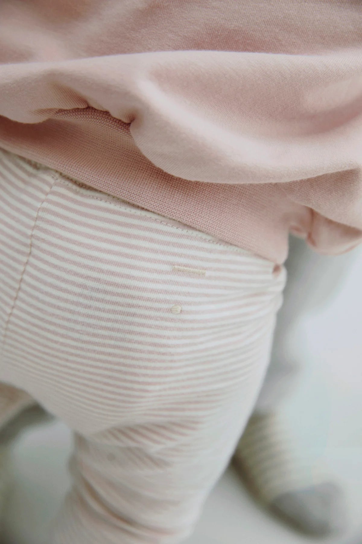 Baby Leggings in faded pink/cream
