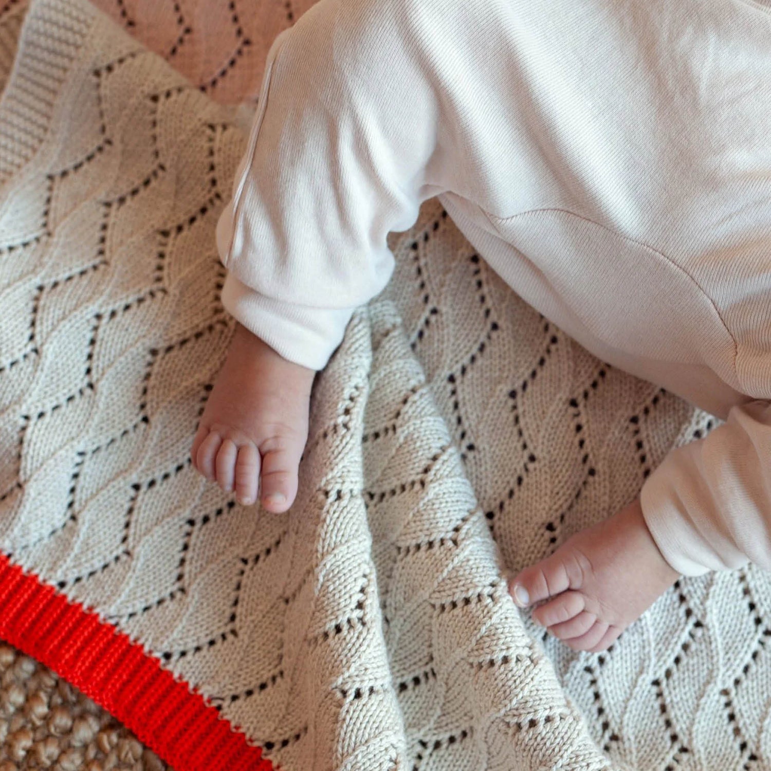 Knitted Baby Blanket in pink/cream