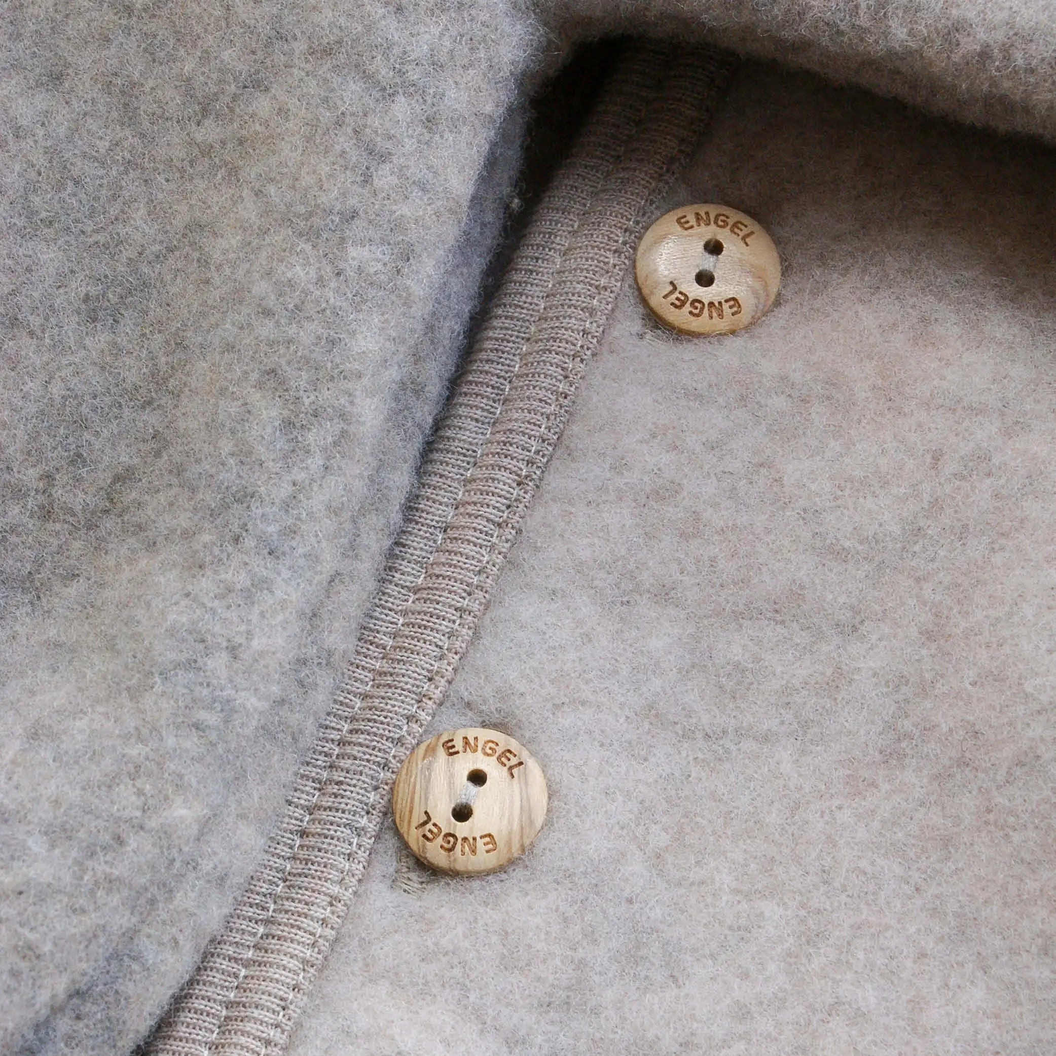 Baby Kapuzenjacke aus Wolle in sand melange