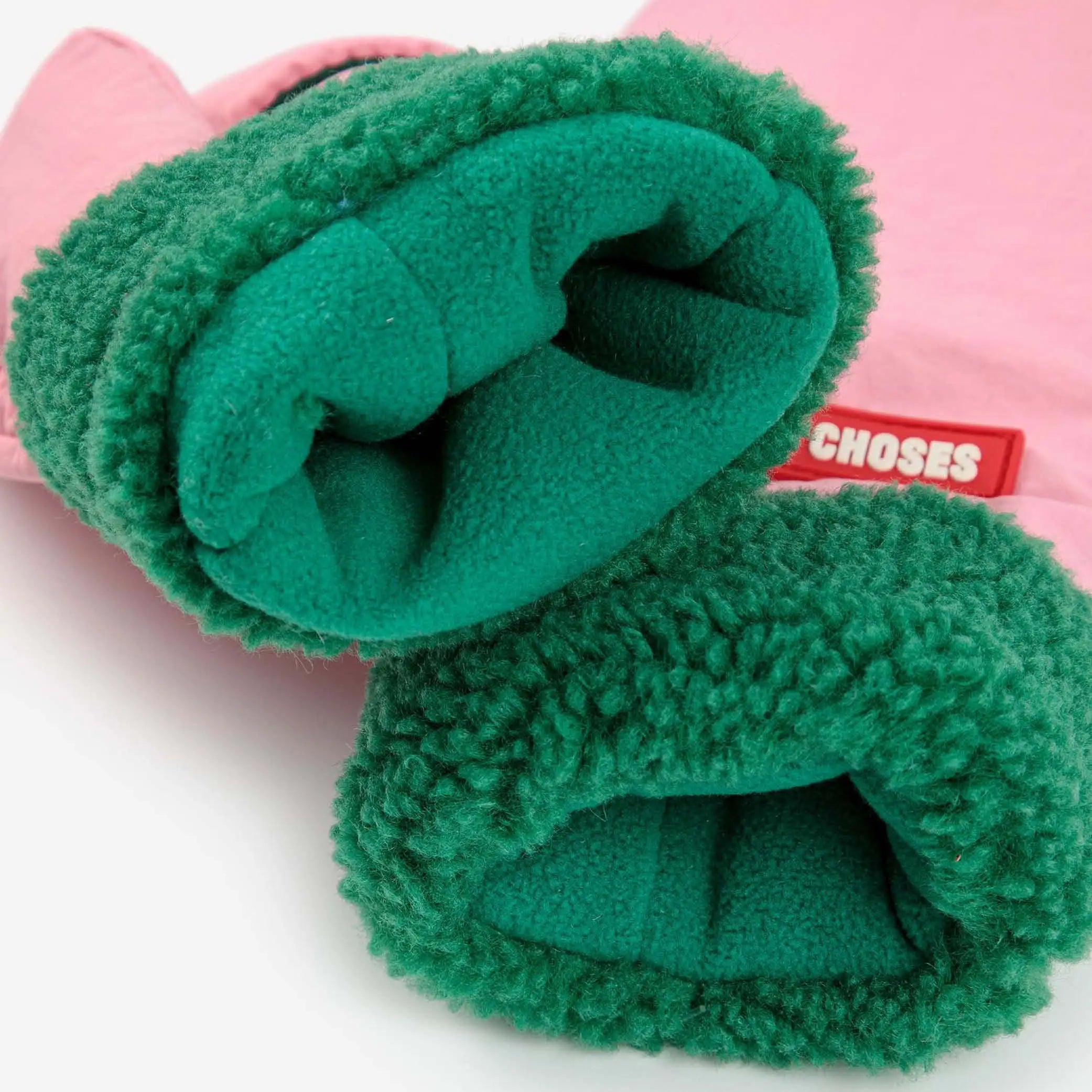 Gefütterte Fäustlinge in rosa