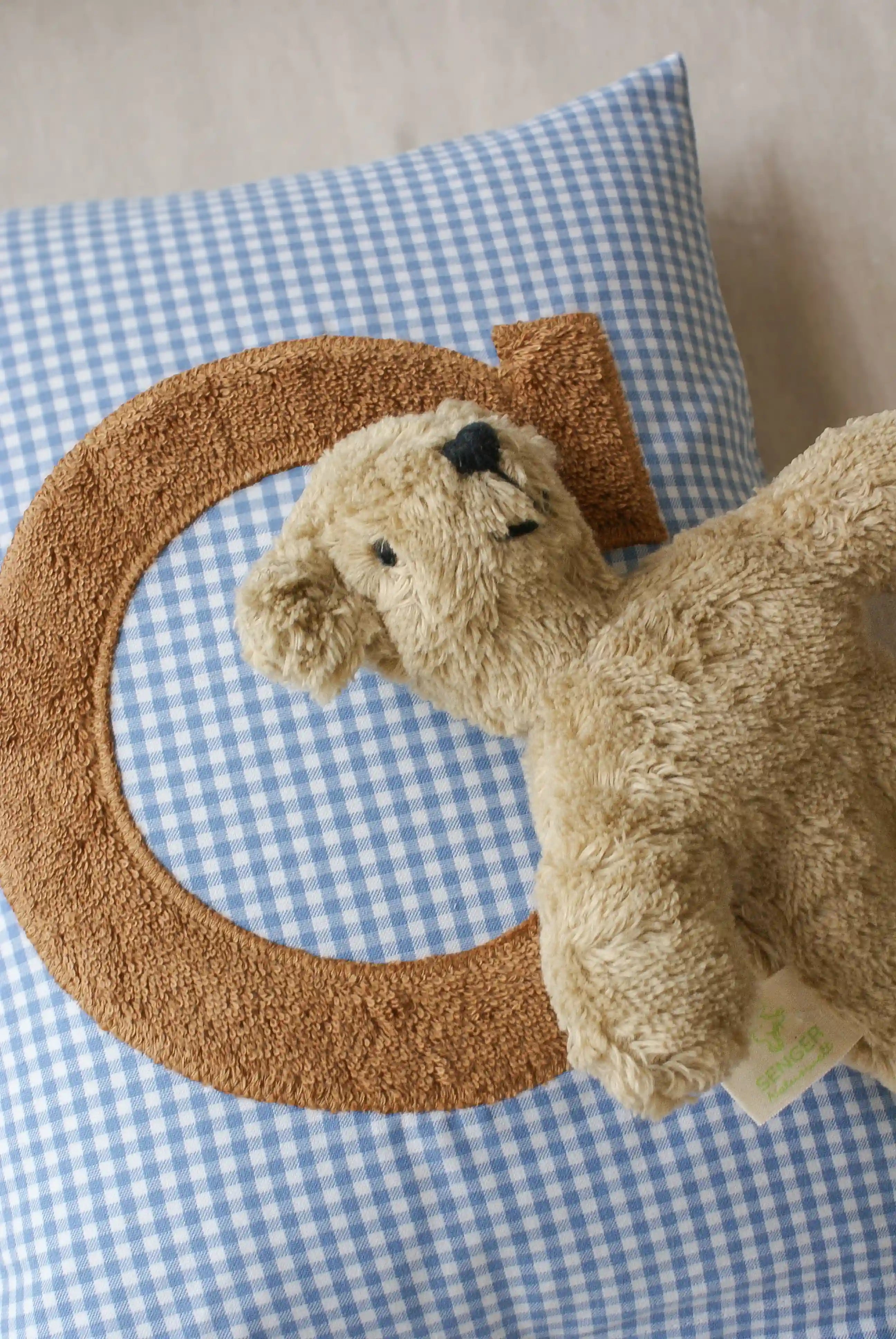 Baby Bär Kuscheltier in beige