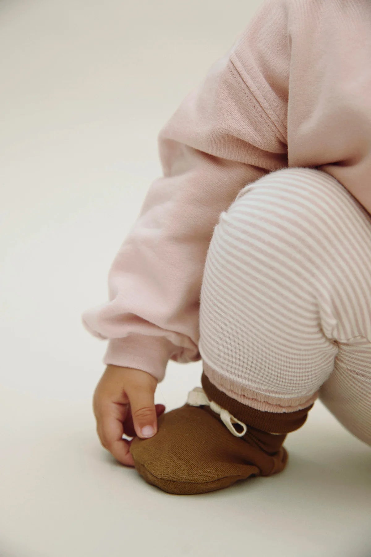 Baby Leggings in faded pink/cream