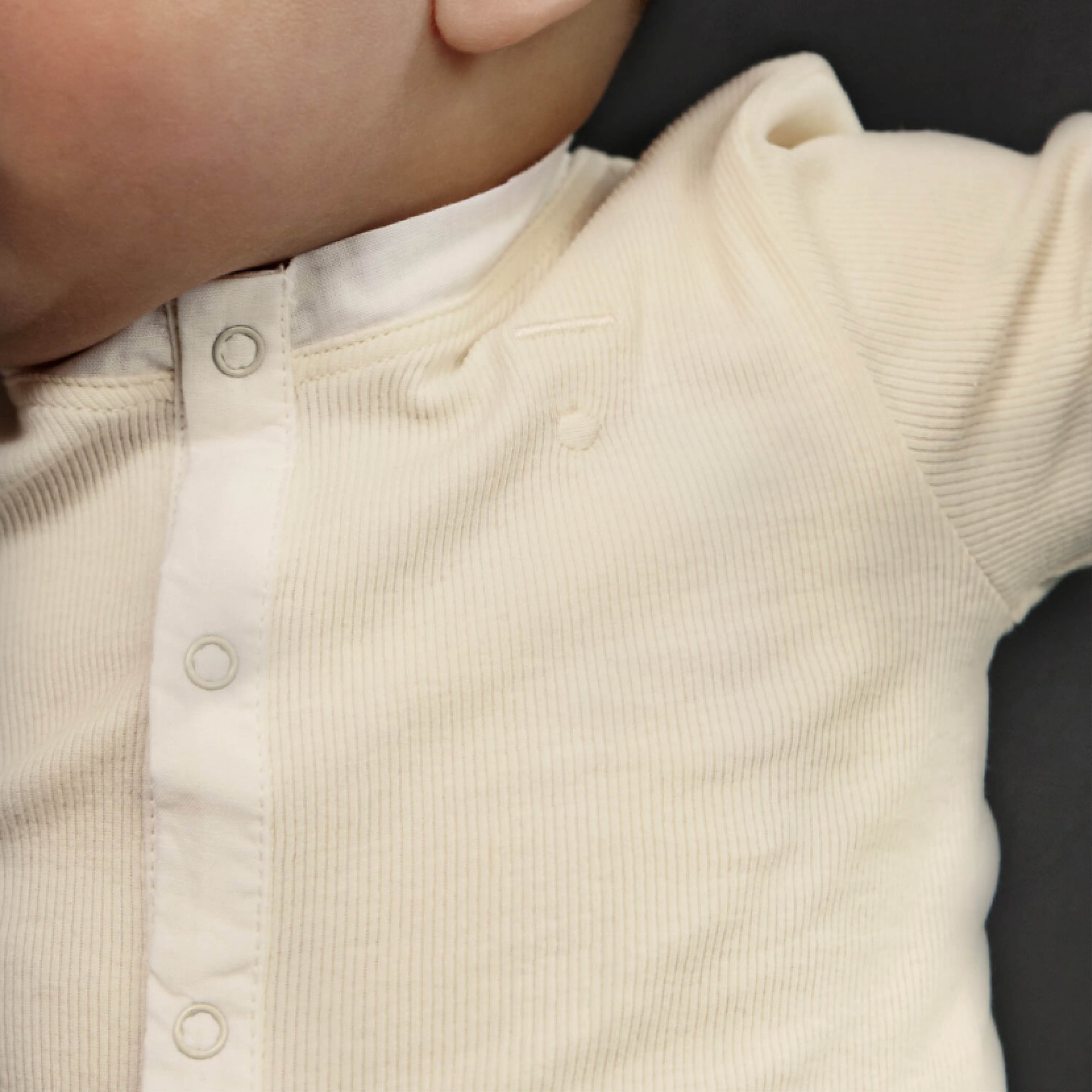 Long-sleeved Baby Body in cream