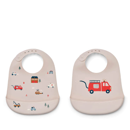 Set of 2, Silicone Bib Tilda in emergency vehicle/sandy