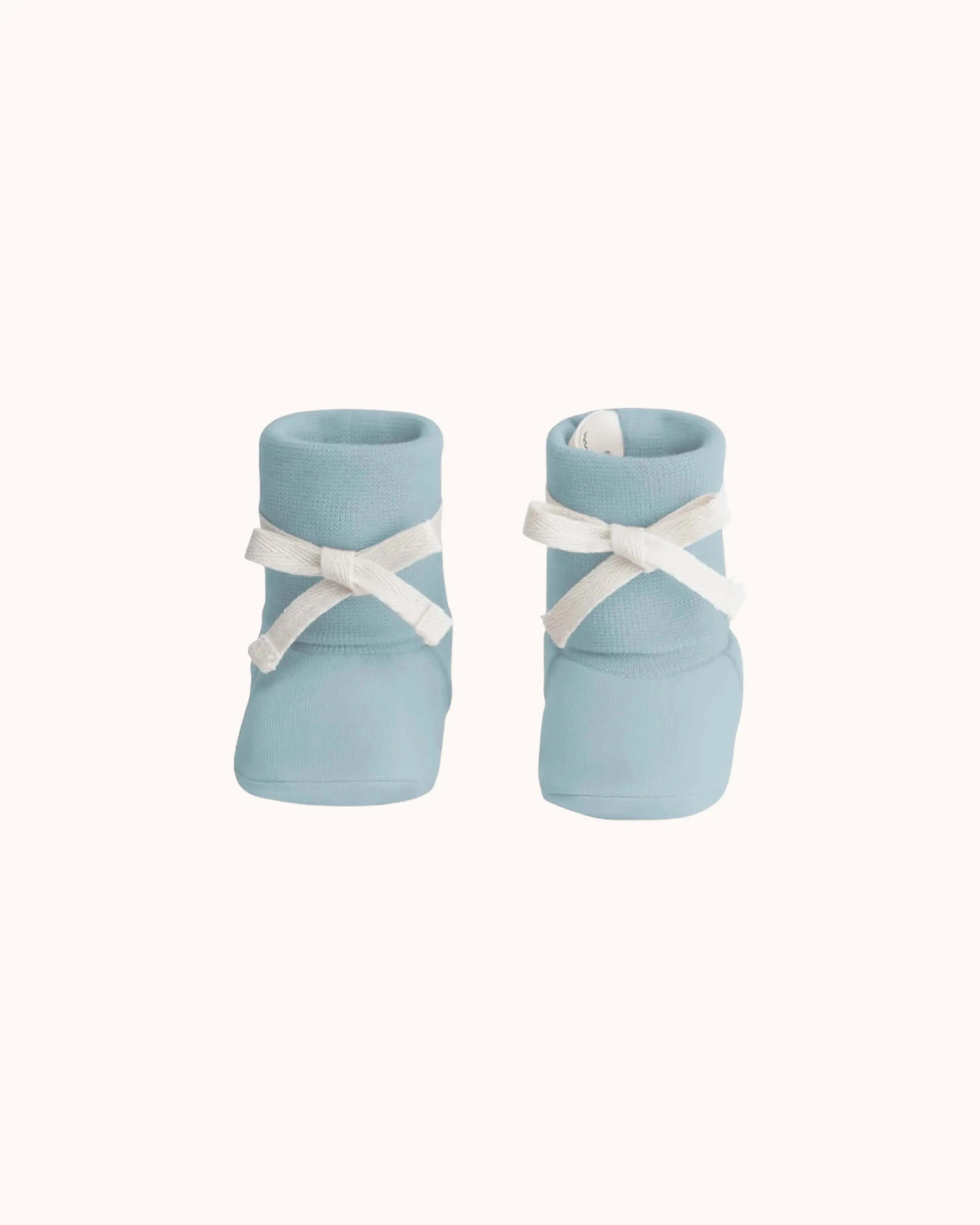Baby Booties in sky