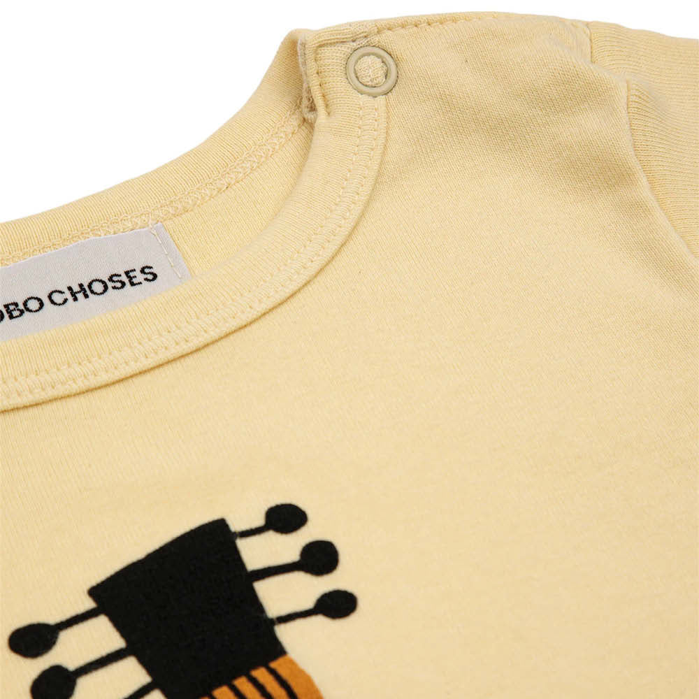 Kurzärmliger Baby Body mit Gitarre