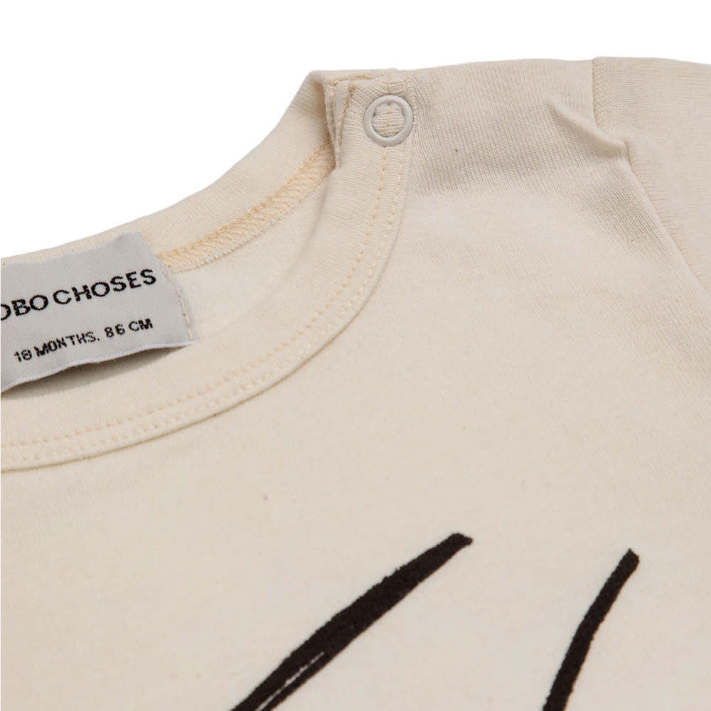 Kurzärmliger Baby Body mit Trommel