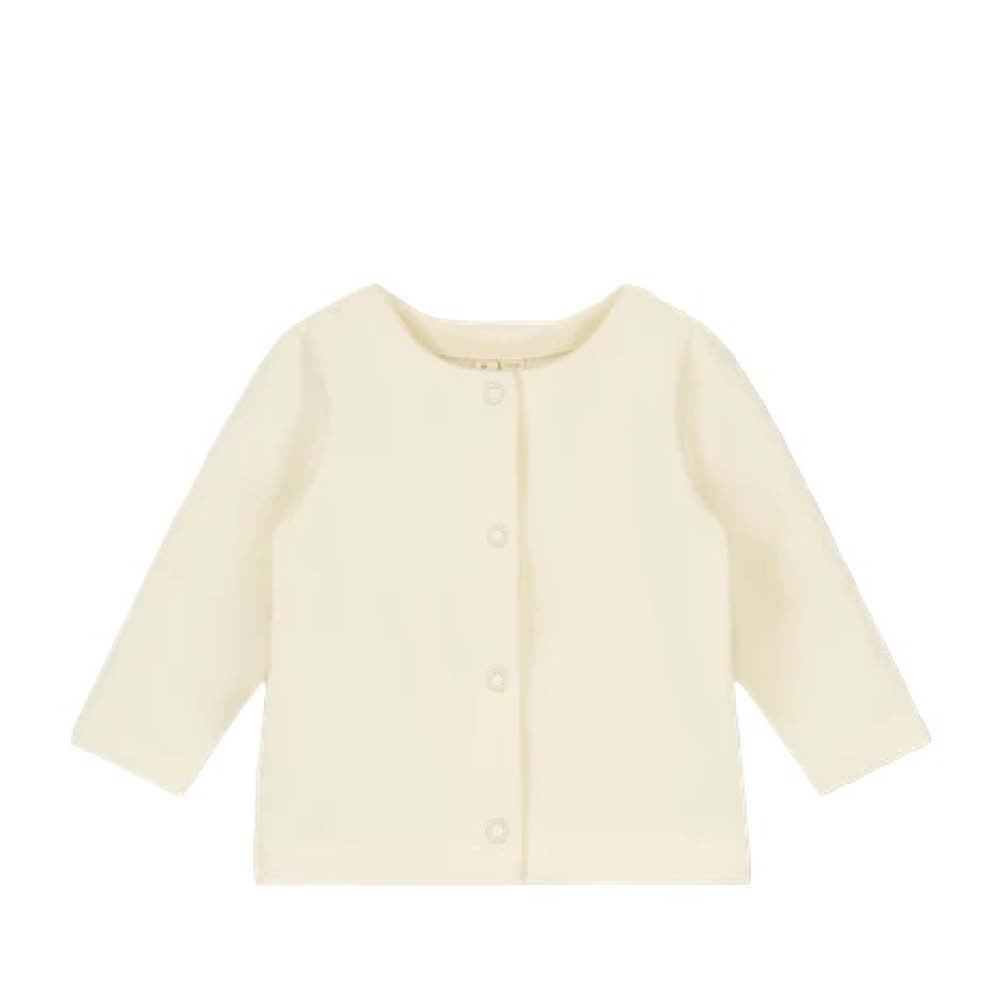 Cardigan bébé couleur crème