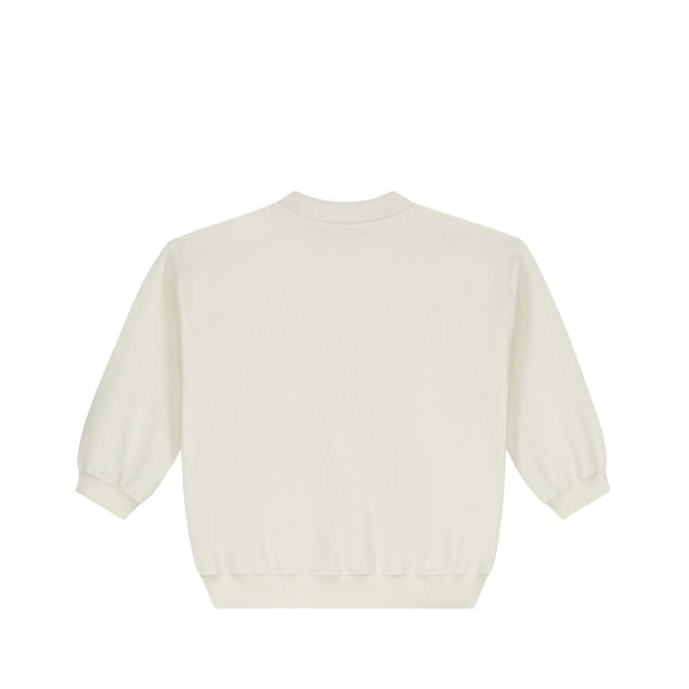 Pull bébé couleur crème