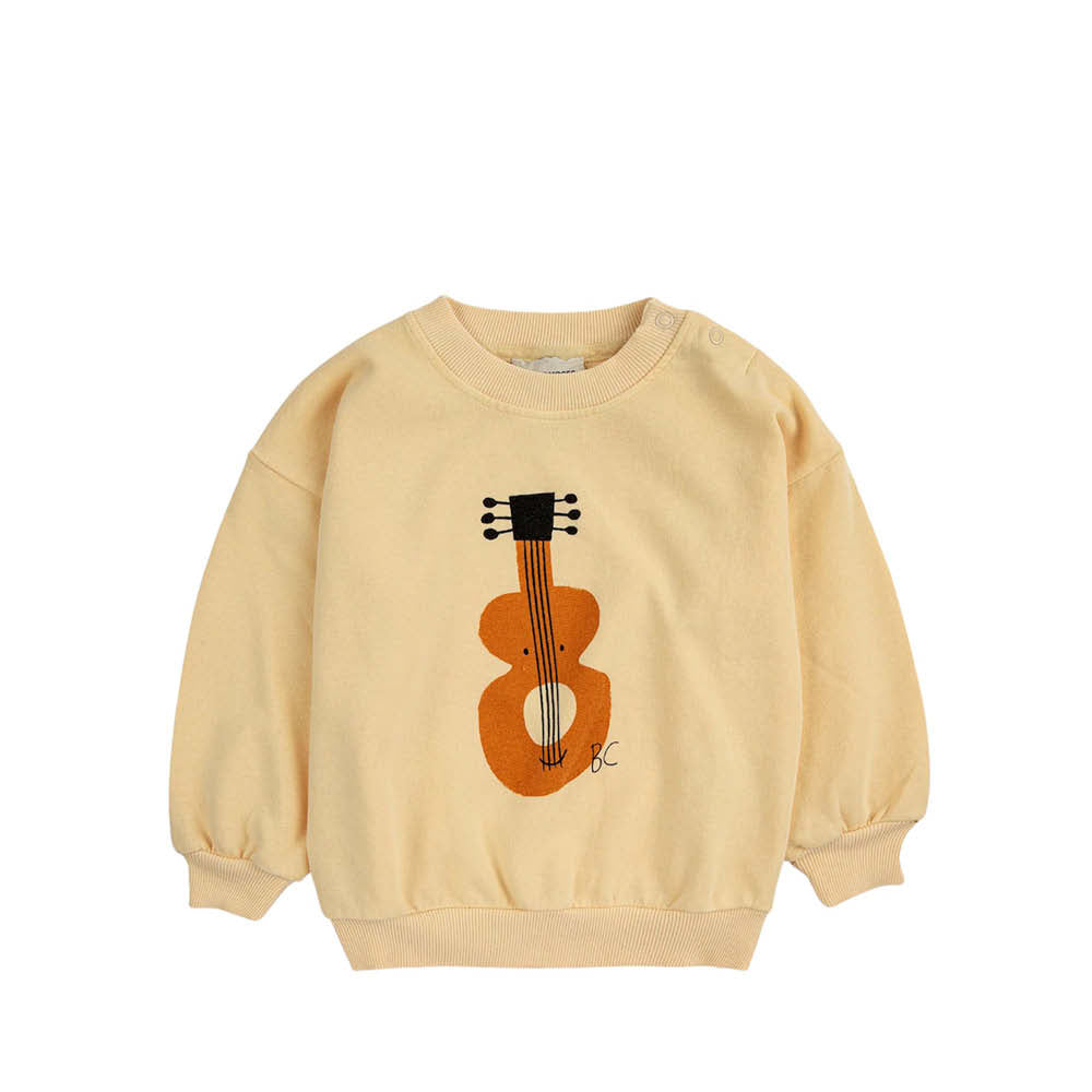 Pull bébé avec guitare
