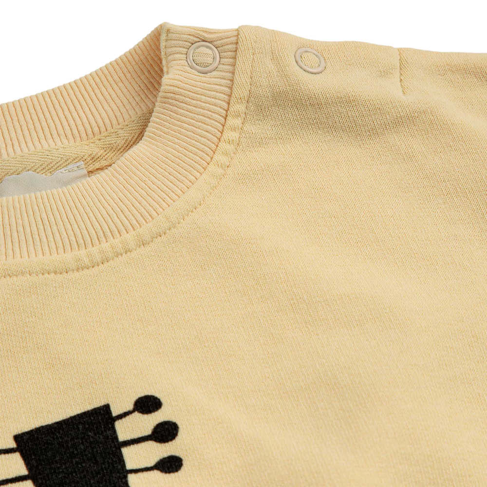 Pull bébé avec guitare