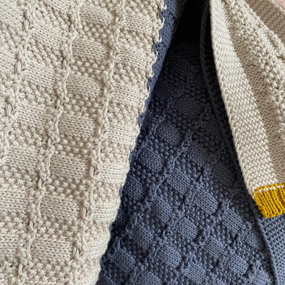 Knitted Baby Blanket in blue/cream