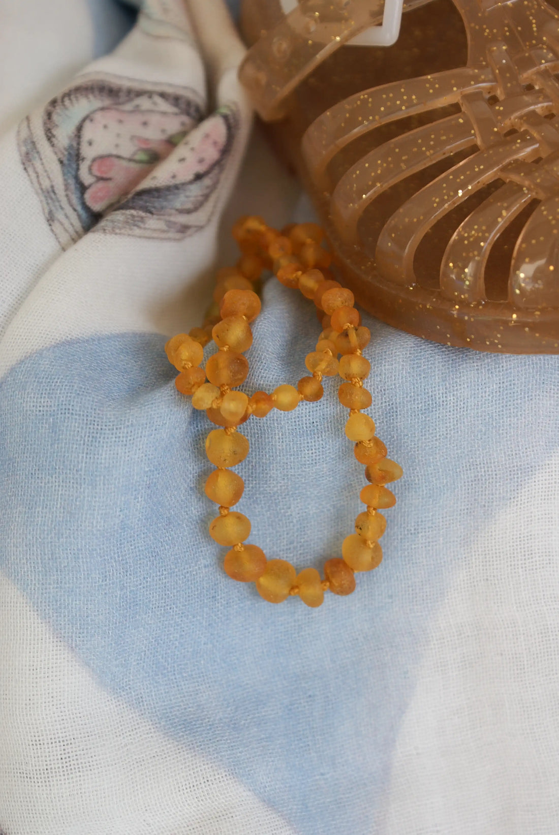 Dental aid, baroque necklace made of baltic amber