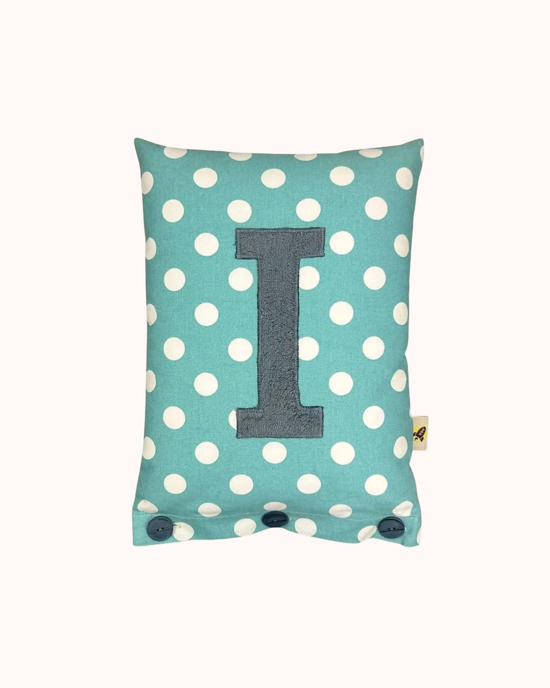 Buchstabenkissen I – Blaugrau auf Türkis mit weißen Punkten