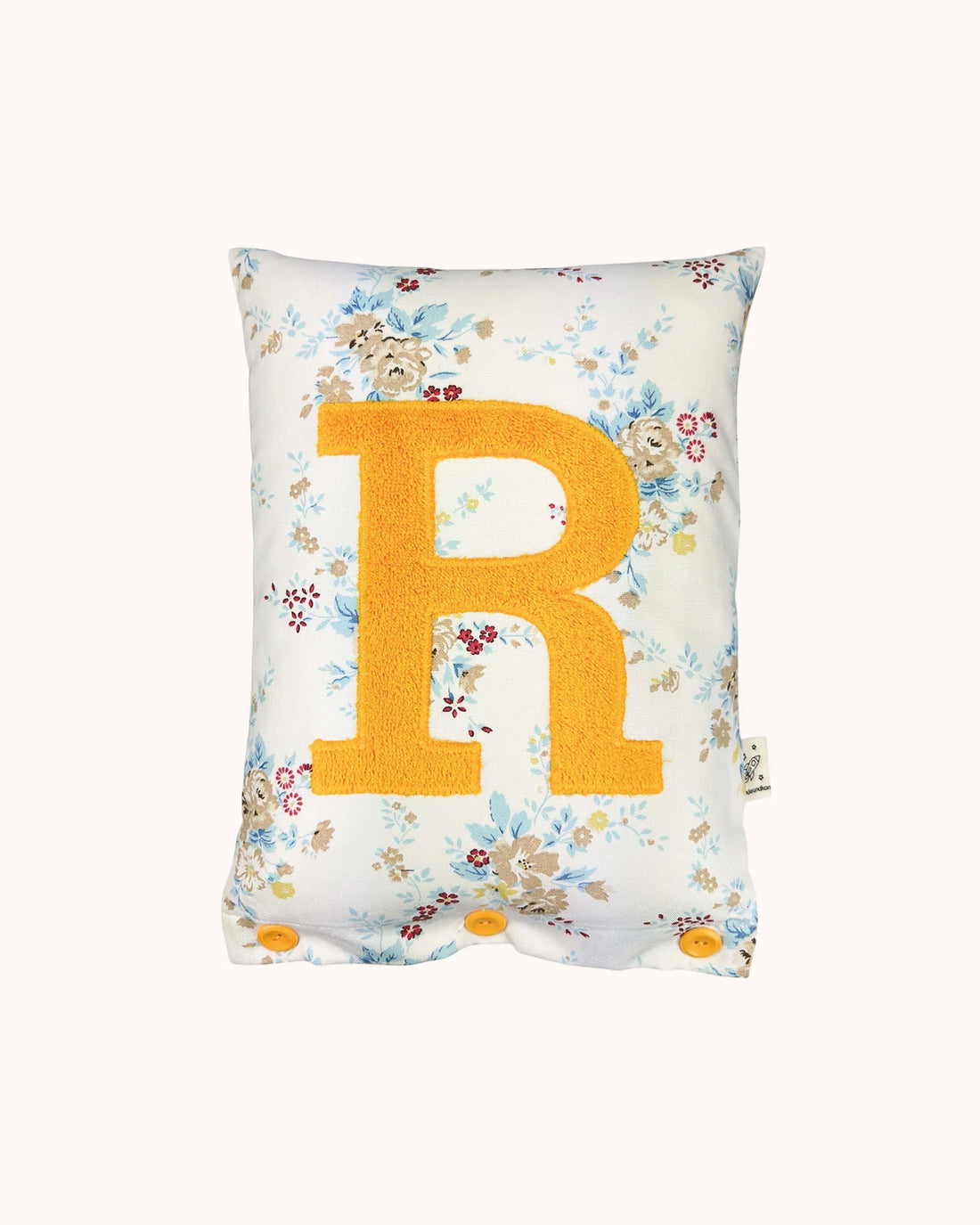 Buchstabenkissen Sonnengelb auf Weiß mit Blumen