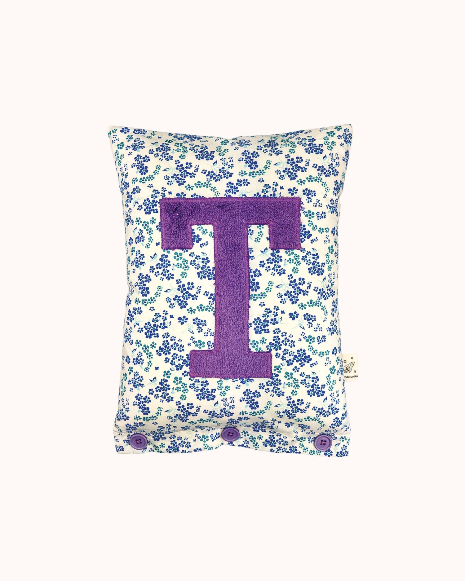 Letter Cushion Purple on White with small blue Flowers