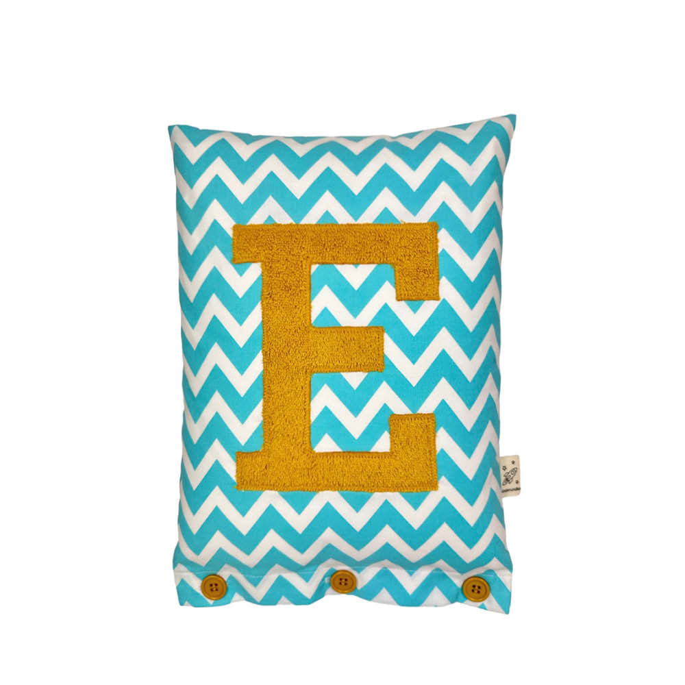 Letter Cushion E, Turmeric on White with turquoise Zigzag