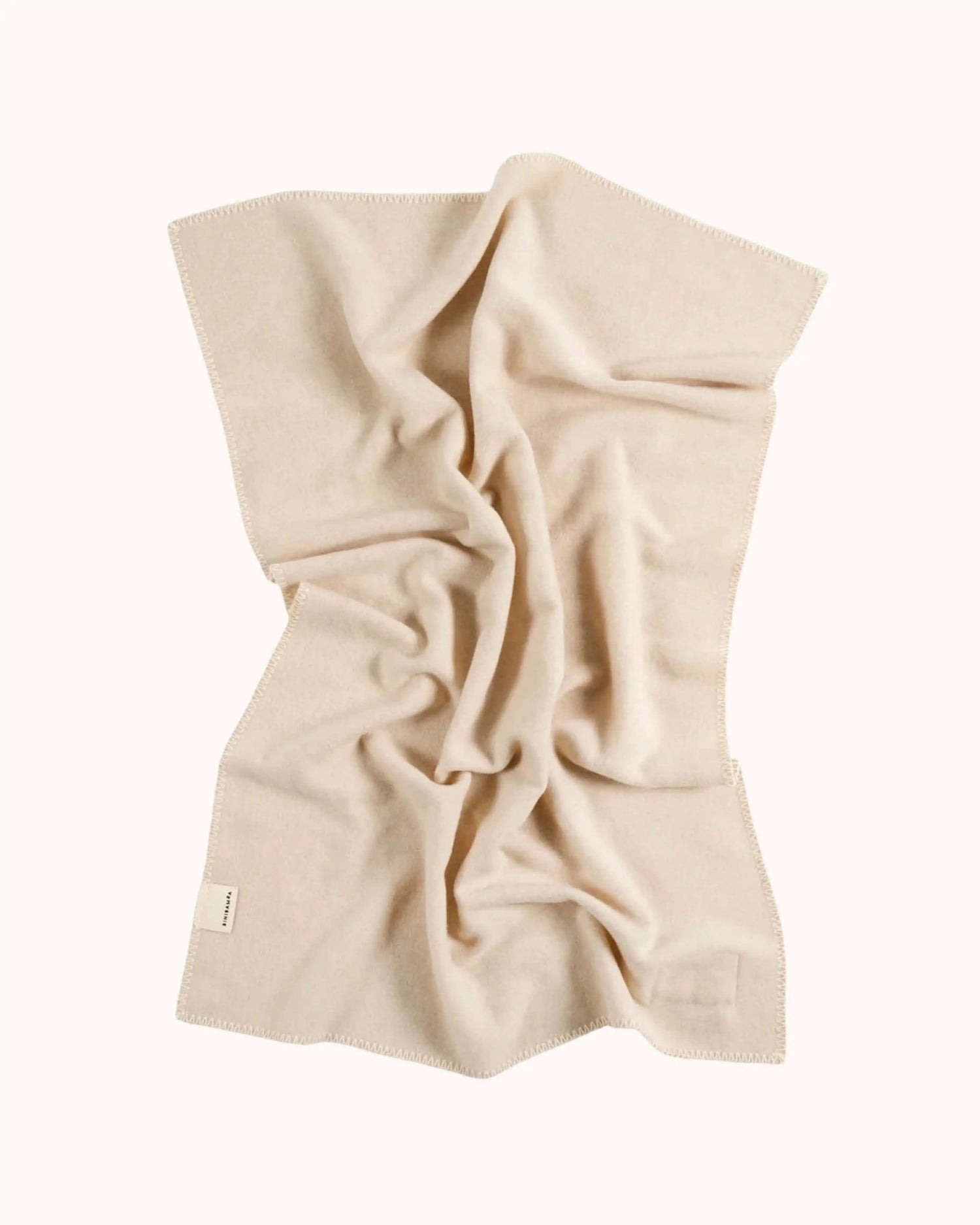 Babydecke aus Merinowolle in caramel/milk