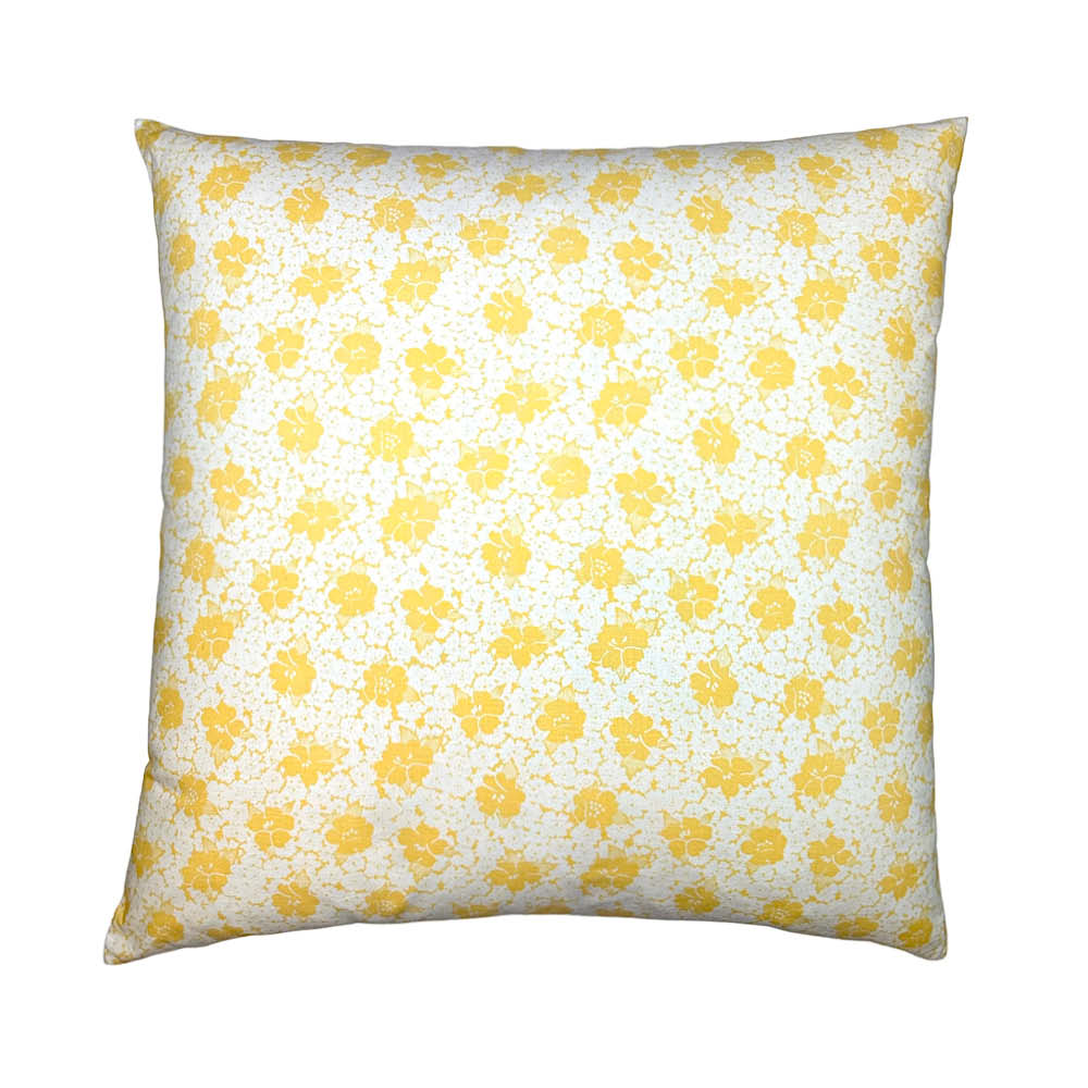coussin avec des fleurs jaunes
