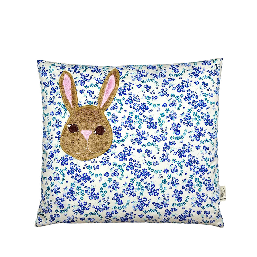 Pixie Cushion Bunny Head on blue Flowers