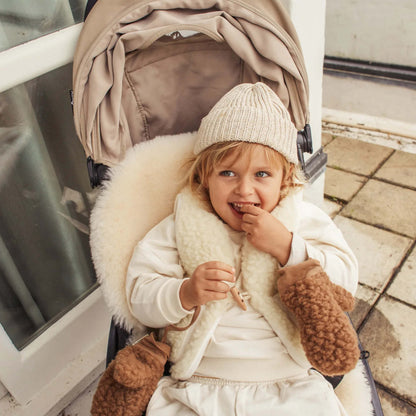 Snuggler Sheepskin in milk