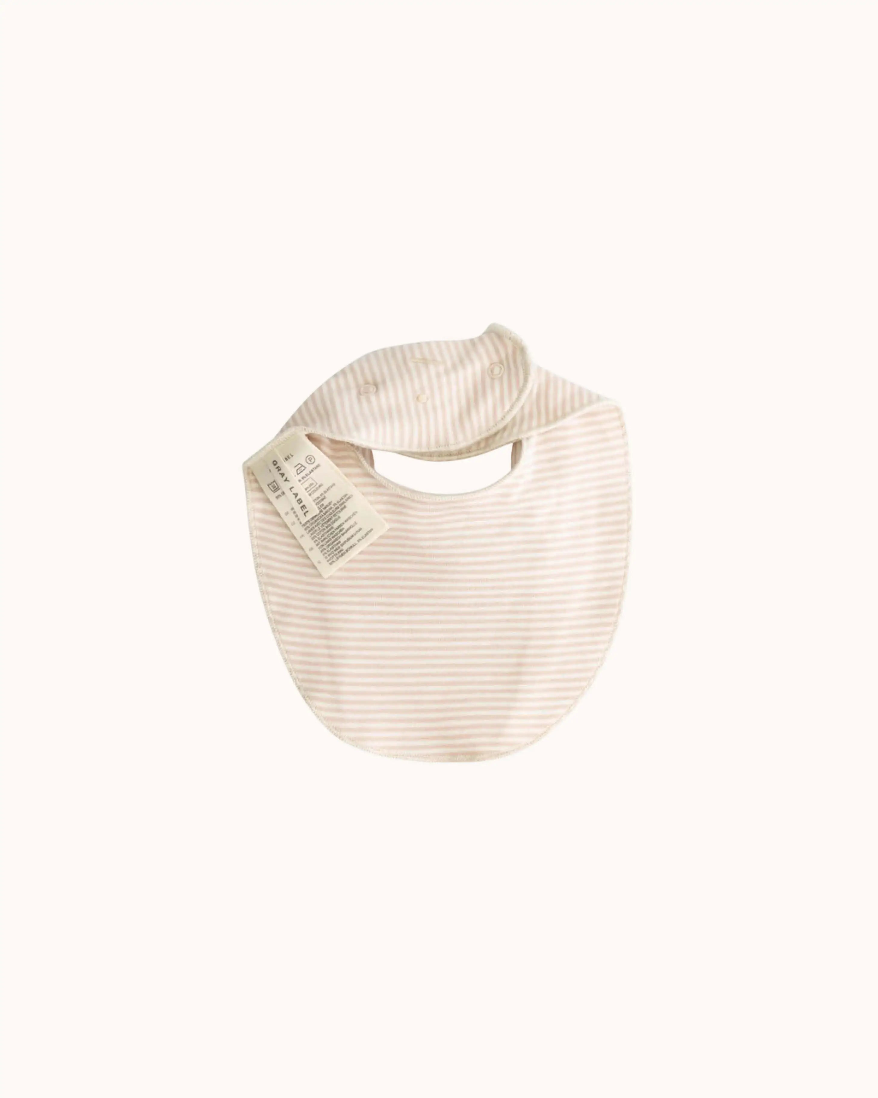 Baby Stofflätzchen in faded pink/cream
