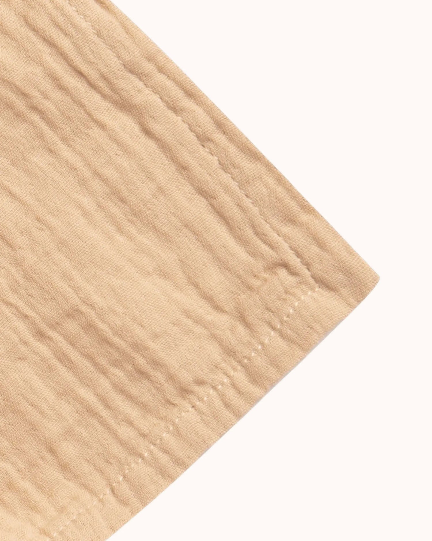 Muslin Swaddle Blanket in hay