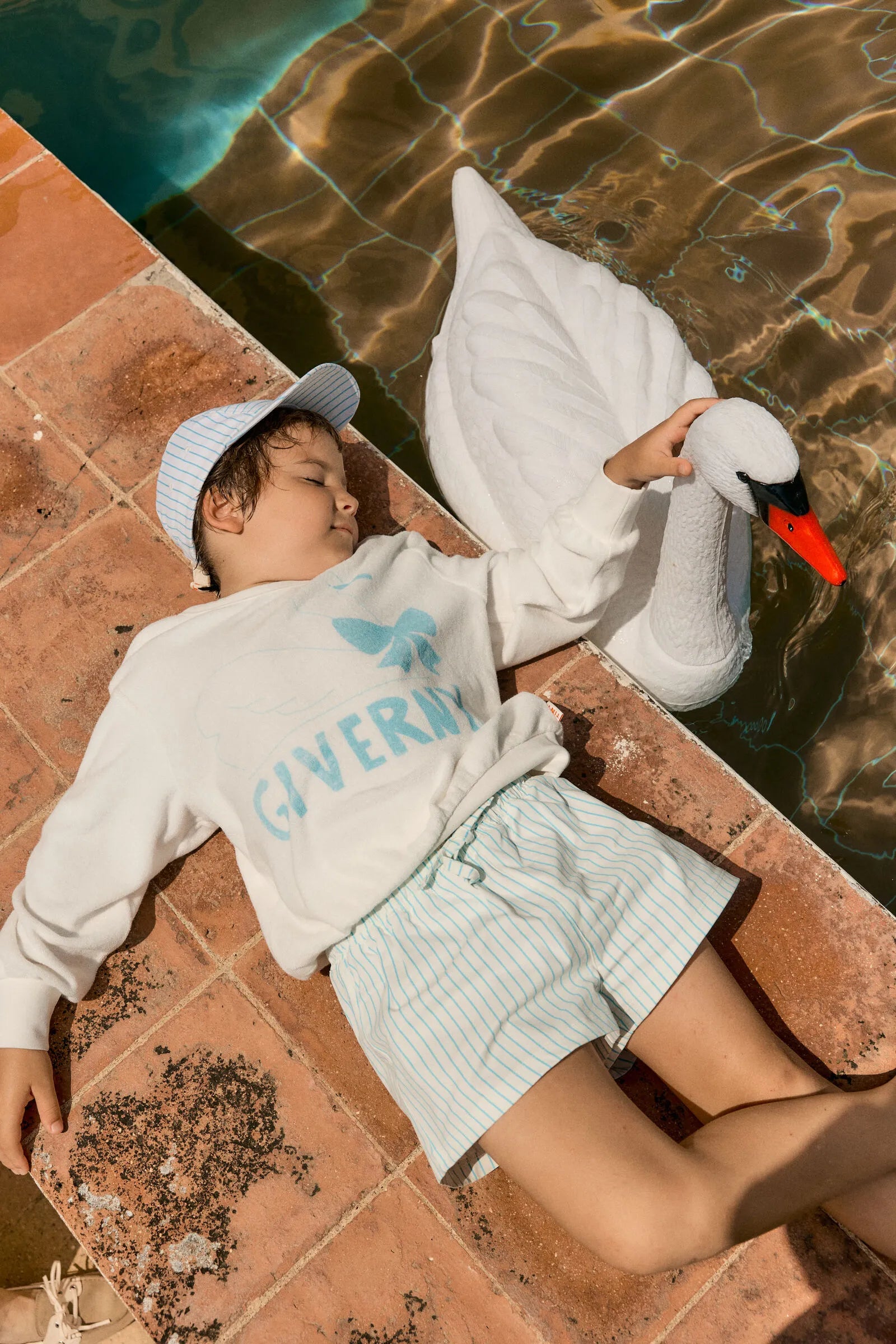 Swim Trunks in cyan striped
