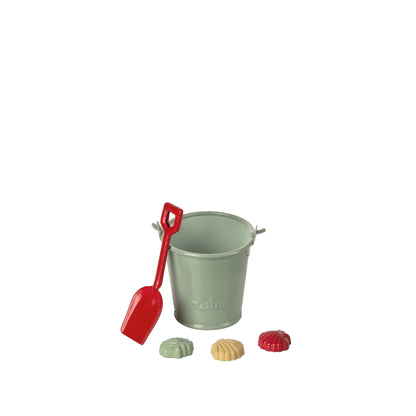 Beach set, bucket with shovel and seashells