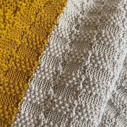 Cotton knit baby blanket in citrus/cream